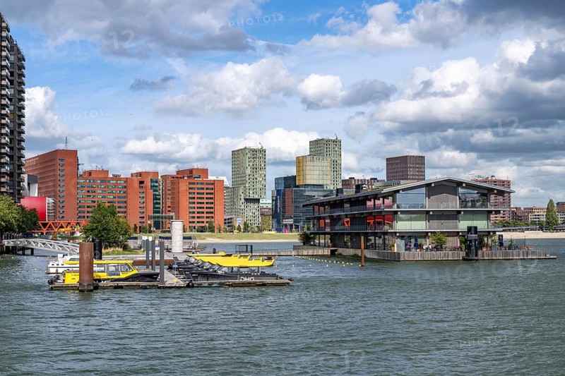 The Floating Office Rotterdam, is considered the world's largest floating office building, jetty for water taxis, in the Rijnhaven, 28ha harbour basin, has now been filled in by almost a third to create space for up to 3000 flats, there will be an artificial beach, a floating park connected by jetties, restaurants and shops, cultural facilities, a major urban development project in the old harbour, the Rijnhaven borders on the popular districts of Kop van Zuid and Katendrecht, Rotterdam, Netherlands
