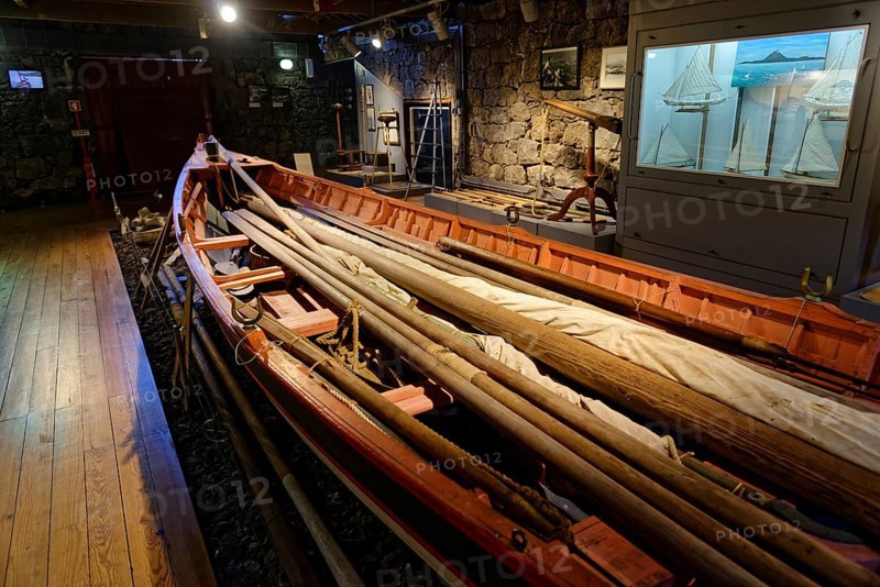 Long, narrow whaling boat in the whaling museum Lajes do Pico, with oars and harpoons, fishing village, Lajes do Pico, Pico Island, Azores, Portugal, Europe