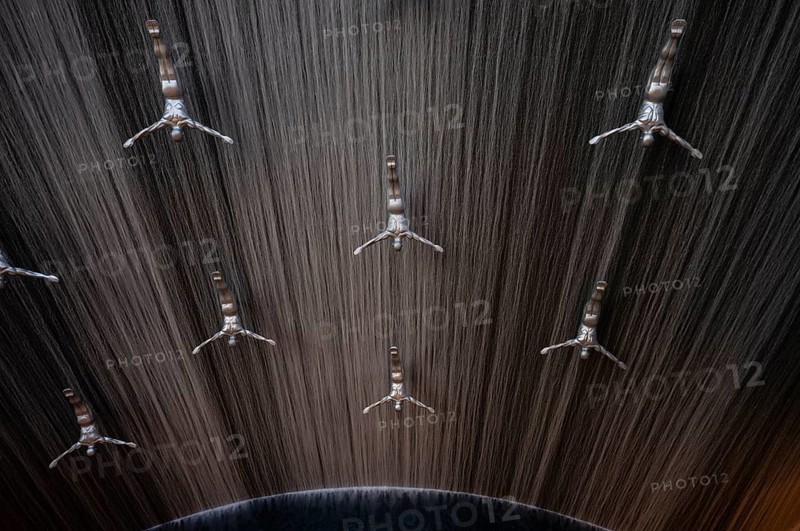 Interior view, The Waterfall, artificial indoor waterfall with life-size jumper sculptures, installation on the pearl diving tradition, Dubai Luxury Shopping Mall, luxury shopping centre, Downtown, Dubai, United Arab Emirates, Asia