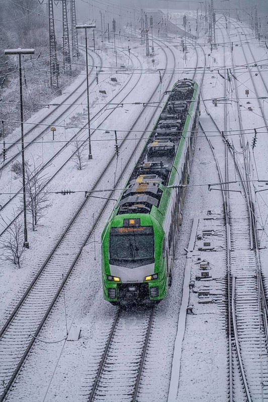 Winter weather, heavy snowfall, railway tracks in front of Essen main station, S-Bahn train, North Rhine-Westphalia, Germany, Europe