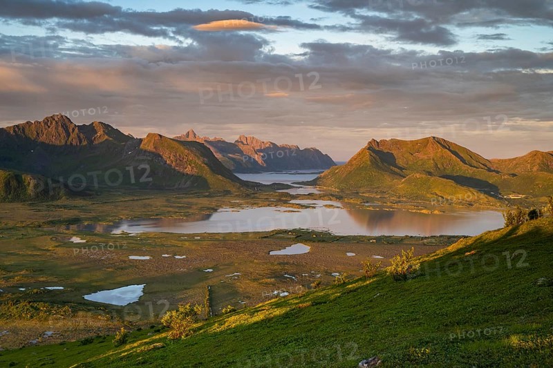 View of the coast and mountains from Mount Hoven, Gimsoy, Lofoten, Norway, Europe
