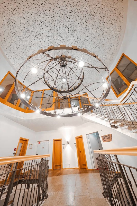 Modern staircase with eye-catching lighting element and metal railing, Hotel Krone Lamm, Zavelstein, Black Forest, Germany, Europe