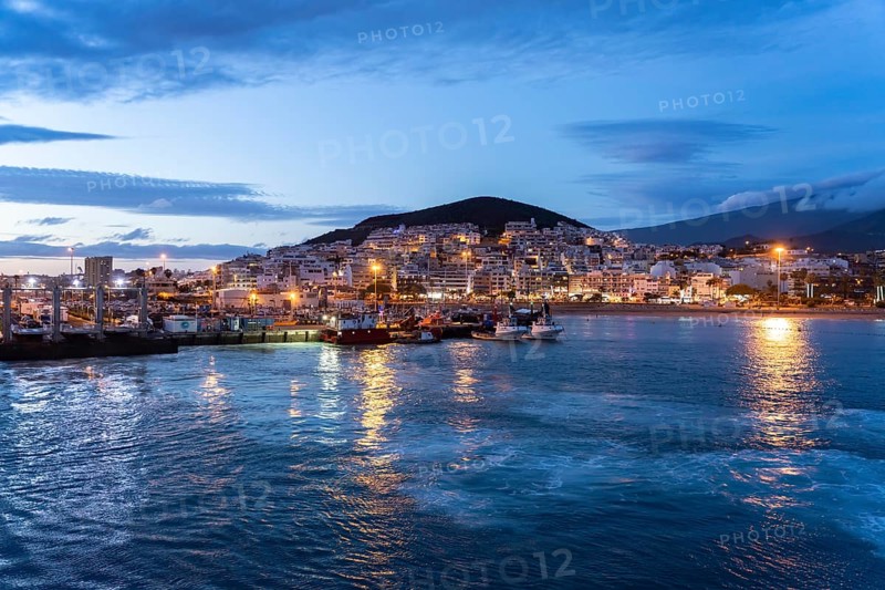 City view of Los Cristianos and the harbour at dusk, Tenerife, Canary Islands, Spain, Europe
