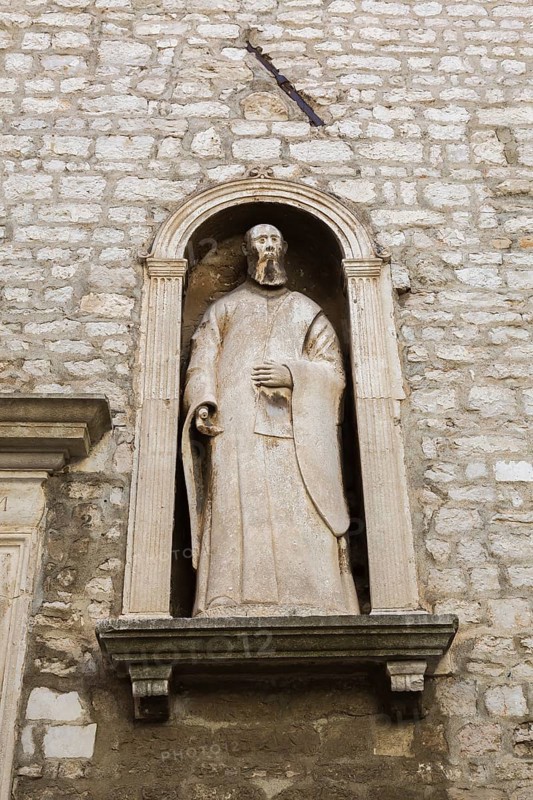 Religious statue in recess on outside wall of City Museum, Sibenik, Croatia, Europe