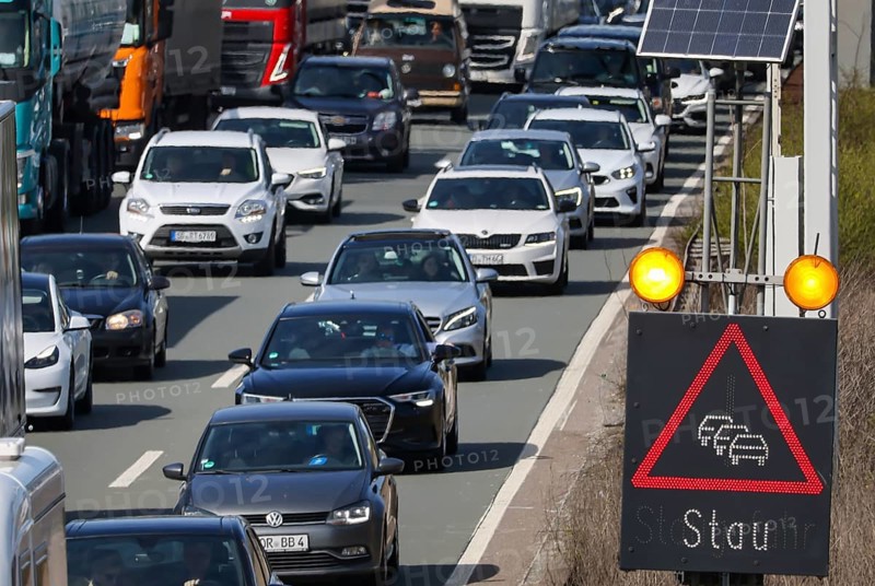 Oberhausen, North Rhine-Westphalia, Germany, traffic jam on the A3 motorway, Easter travel traffic, cars, vans, trucks, caravans and campers are stuck in the traffic jam, Europe