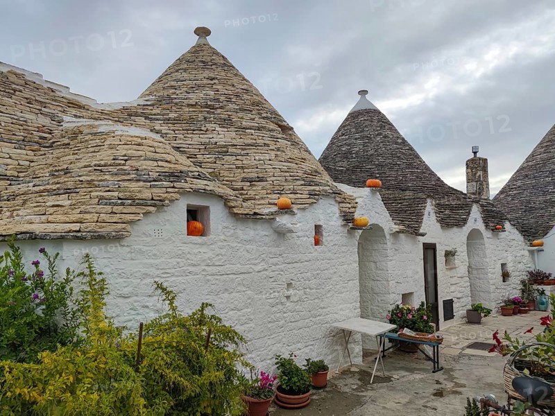 Trulli house decorated with pumpkins, Alberobello, UNESCO World Heritage Site, Apulia, Italy, Europe