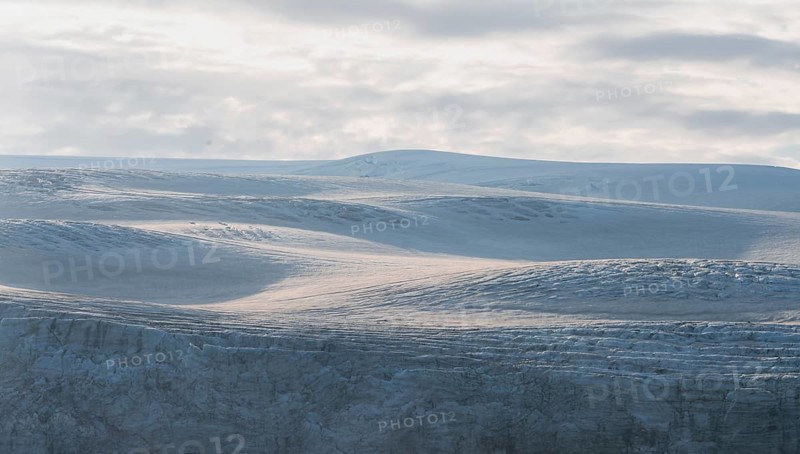 Snow and glacier ice of the Myrdalsjökull glacier in the evening light, Pakgil, Iceland, Europe