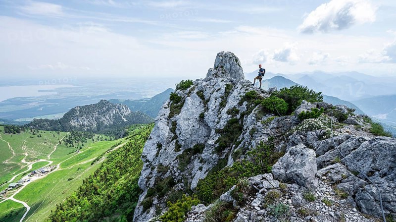 Climber on a climbing tour, climber on a mountain ridge, alpine climbing, crossing the Kampenwand, Chiemgau, Bavaria, Germany, Europe