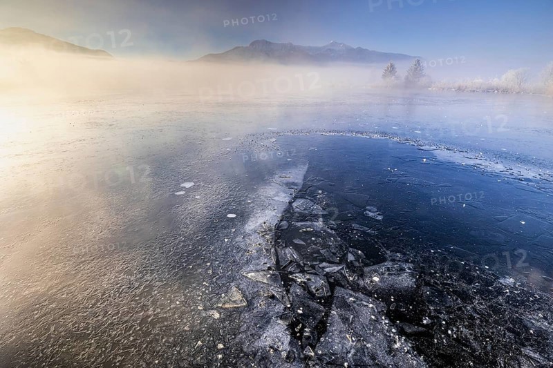 Frozen lake, ice, icy, morning light, fog, winter, mountains, Loisach-Lake Kochel moor, view of Herzogstand, Heimgarten, Alpine foothills, Germany, Europe