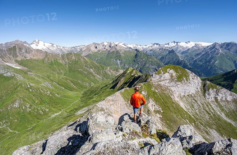 Mountaineer in front of mountain panorama with Großvenediger, mountain landscape with mountain peaks of the Venediger group, view from the summit of the Gösleswand, Lasörling group, Hohe Tauern National Park, East Tyrol, Tyrol, Austria, Europe