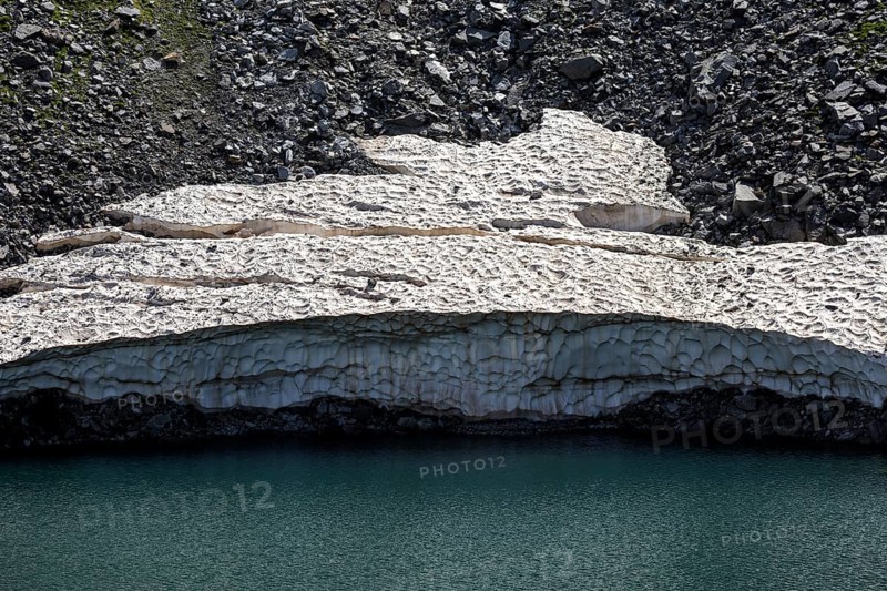 Remains of snow in Lake Sassolo, Lago di Sassolo, Sambuco Valley, Vale Sambuco, near Fusio, Lavizzara, Canton Ticino, Switzerland, Europe