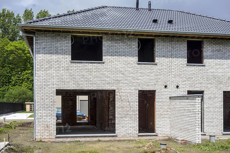 Construction phase of newly built house, new development semi-detached house