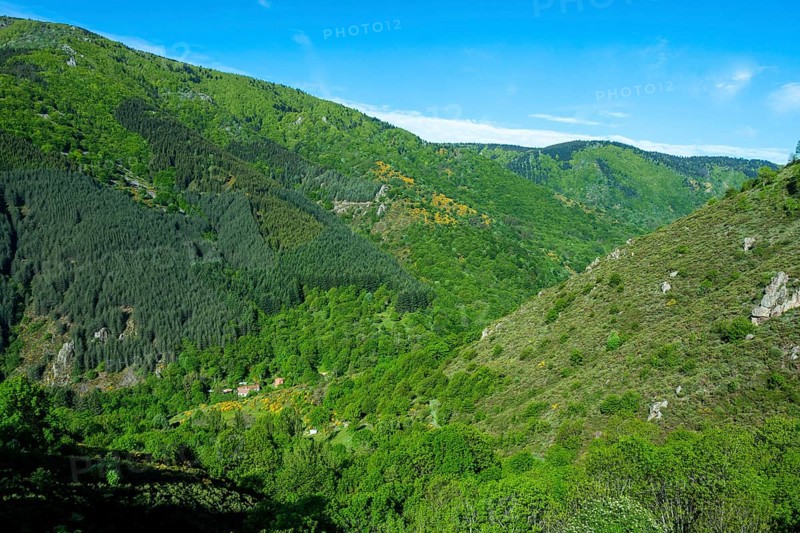 View of the Vivarais mountains from the rise of Col de la Chavade. Ardeche. Auvergne-Rhone-Alpes. France