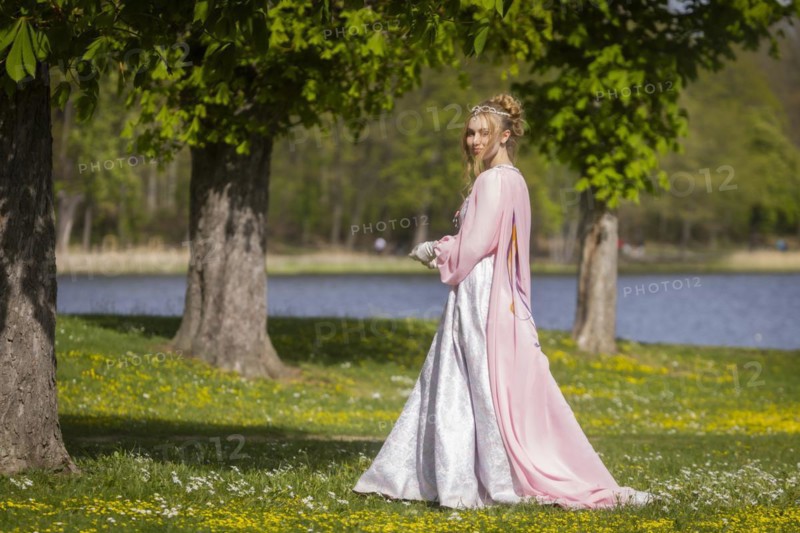 Cinderella can also be seen around Moritzburg Castle in spring. Model Tamara Kretschmer once again slipped into the coveted role of the legendary Cinderella with the ball gown, Moritzburg, Saxony, Germany, Europe