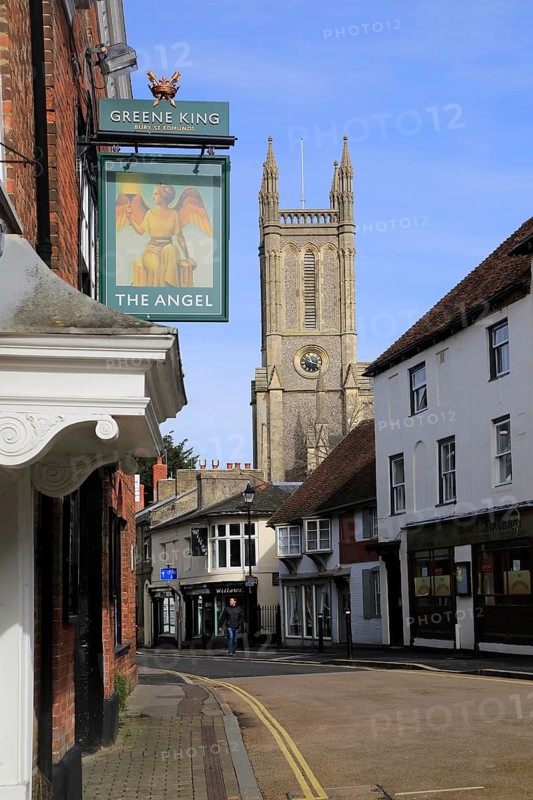 Church tower historic buildings Angel pub sign, town centre Andover, Hampshire, England, UK