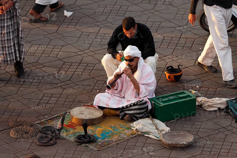 Snake charmer on the Djemaa el Fna square in Marrakech, Morocco, Africa