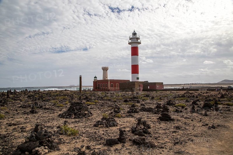 Red and white striped lighthouse, Faro de Toston, El Cotillo, Fuerteventura, Canary Islands, Spain, Europe