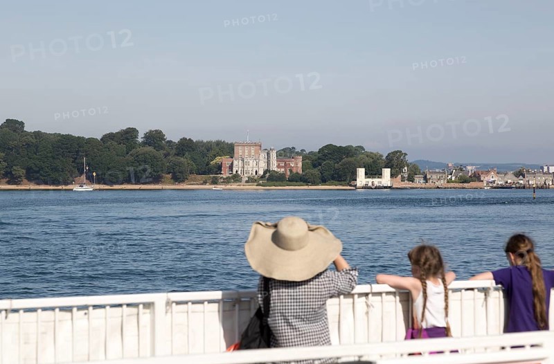 Brownsea castle on Brownsea Island, Poole harbour, Dorset, England, UK viewed from Sandbanks to Studland ferry