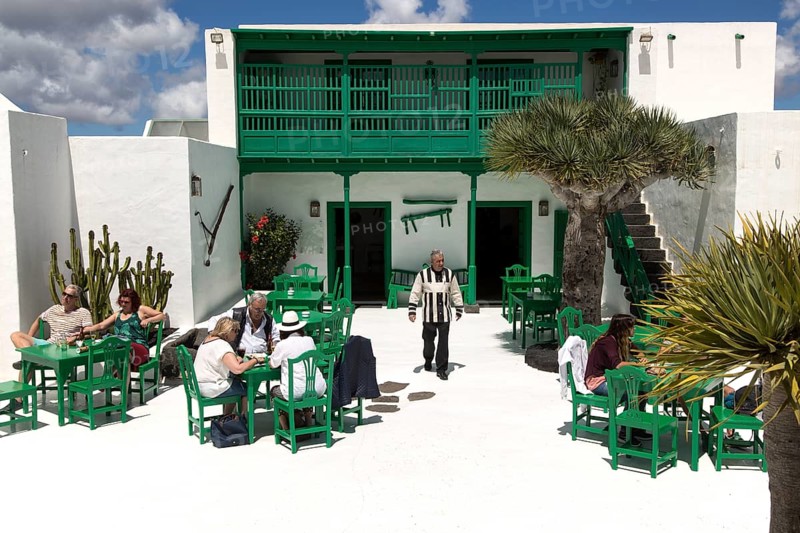 Museum and folklore arts centre, Casa Museo Monumento al Campesino, Lanzarote, Canary Islands, Spain- waiter wearing uniform designed by Cesar Manrique