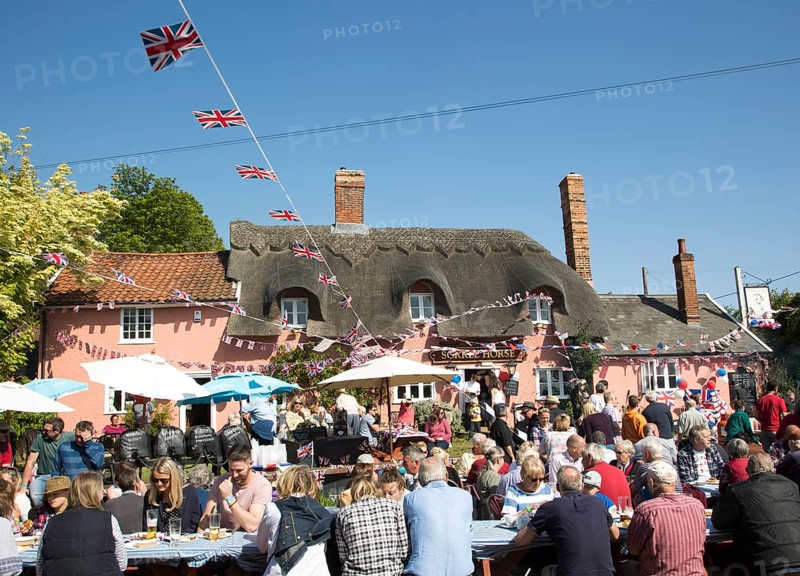 Street party celebrating royal wedding of Prince harry and Meghan Markle, Sorrel Horse Suffolk, England, UK May 19, 2018 Duke and Duchess of Sussex