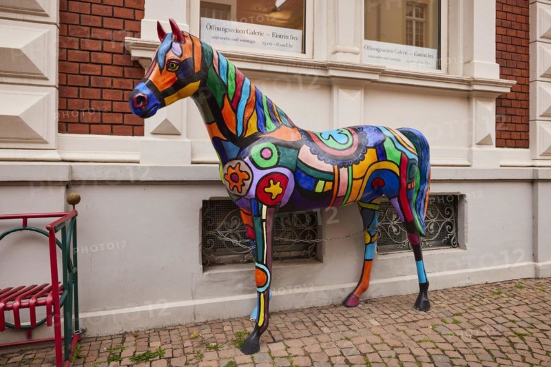 Colourful horse sculpture in the style of Pop Art in the city of horses Warendorf, district of Warendorf, North Rhine-Westphalia, Germany, Europe