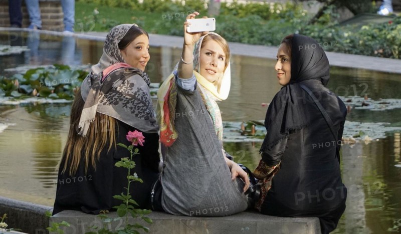 Three young Iranian woman take a selfie photo of themselves, Tehran, 22/05/2016
