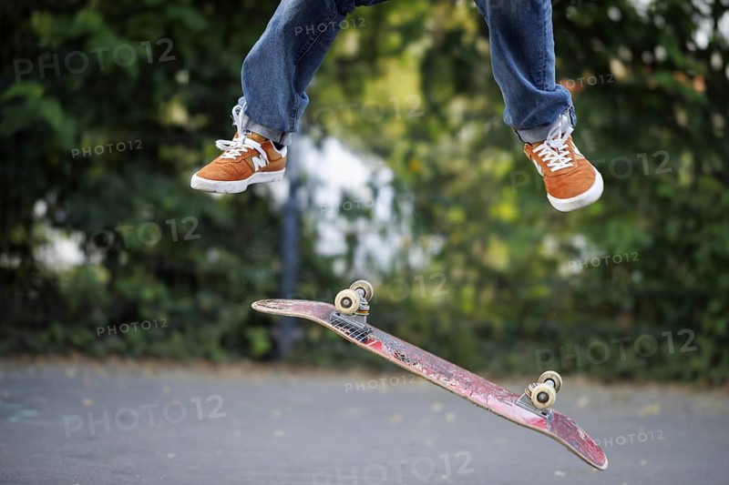 A person does a kickflip on a skateboard in Berlin, 16/08/2024