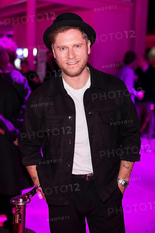 Johannes Oerding on the red carpet in front of the Polyton 2024 award ceremony in Berlin's Atelier Gardens on 23 October 2024. The award has been taking place since 2023 and is a successor to the Echo music award