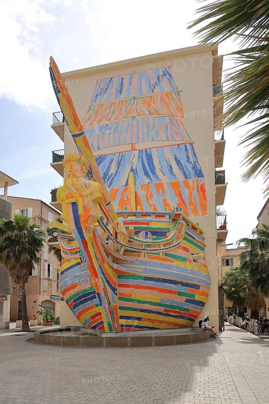 Sculpture Le Bateau Sculpture by Alexandre-Benjamin Navet 1995, colourful ship with Neptune as figurehead, street art, palm tree, houses, Place Vatel, Toulon, Var, Provence, France, Europe