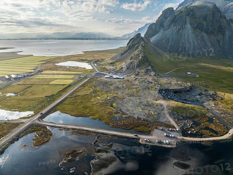 Aerial view of guesthouse, cafe and campsite at Stokksnes, foot of Mt. Vestrahorn, black lava beach, east of Höfn, East Fjords, Iceland, Europe