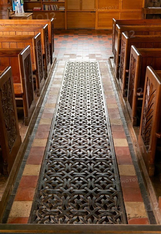 Detail of ironwork metal floor grating, church of Saint Mary the Virgin, Silchester, Hampshire, England, UK