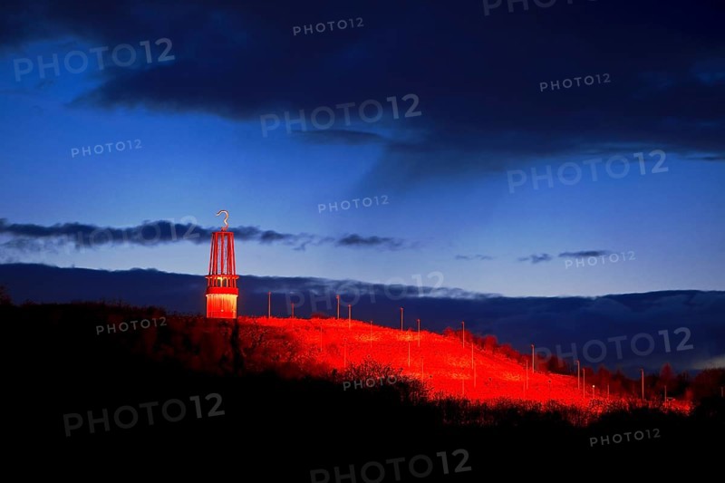 Artwork Illuminated at night with red illuminated slagheap Rheinpreussen by Otto Piene, Moers, Ruhr Area, North Rhine-Westphalia, Germany, Europe