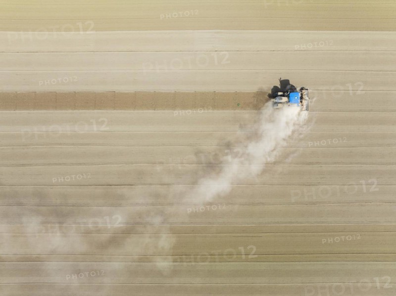 Tractor at field work. Aerial view. Drone shot. Cádiz province, Andalusia, Spain, Europe