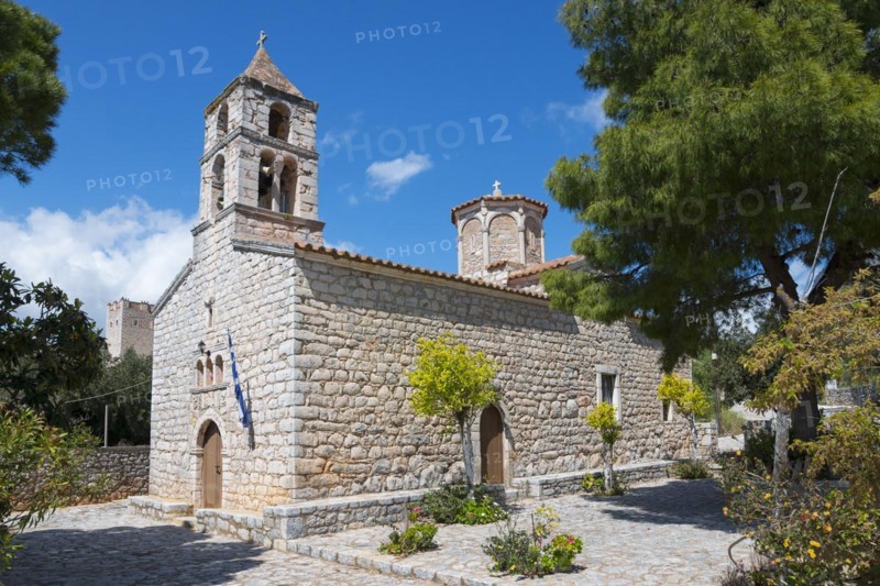 An old stone church under a blue sky surrounded by greenery, Abundant Life Church, Areopolis, Tsimova, Itylo, Anatoliki Mani, Mani, Laconia, Peloponnese, Greece, Europe