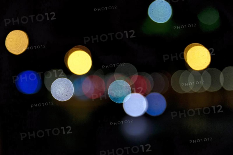 Bokeh balls, abstract dark background with blue and yellow lights, night shot, Barcelona, Spain, Europe