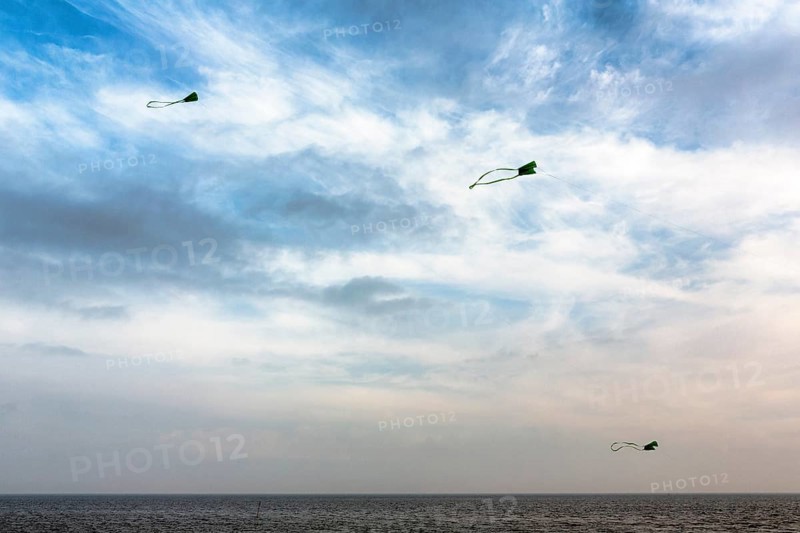 Three kites flying in the evening sky, autumn weather, Wyk auf Föhr, Föhr Island, North Frisia, North Sea, Schleswig-Holstein, Germany, Europe