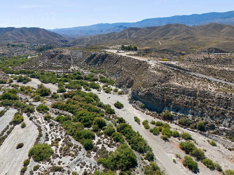 Dry landscape with hills and river valleys under a sunny sky, aerial view, Tabernas Desert, Desierto de Tabernas, Tabernas, Almeria, Andalusia, Spain, Europe