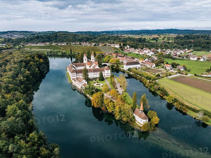 Aerial view of the former Benedictine abbey with the monastery church of St Mary and the pointed church of St Magdalena on the Rhine island of Rheinau, Andelfingen, Canton Zurich, Switzerland, Europe