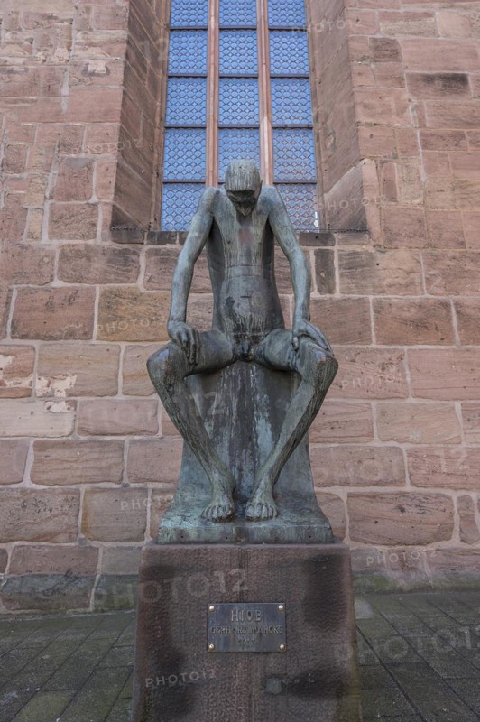 Bronze sculpture of Job, created by the German sculptor Gerhard Marcks in 1957, in front of St Clare's Church, Königstraße 66, Nuremberg, Middle Franconia, Bavaria, Germany, Europe
