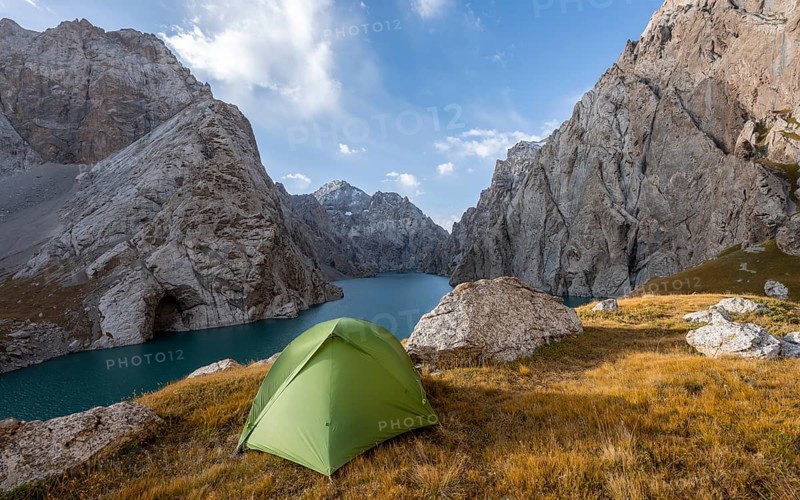 Wild camping, camping in the wilderness with a tent in front of mountain lake Kol Suu, Sary Beles Mountains, Naryn Province, Kyrgyzstan, Asia