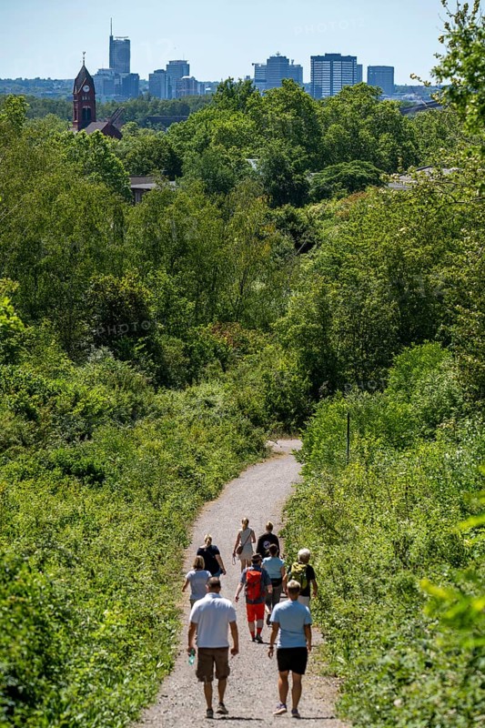 Hiking trail on the Zollverein slagheap 4/11, in Gelsenkirchen, with a view of the city centre of Essen, Germany, Europe