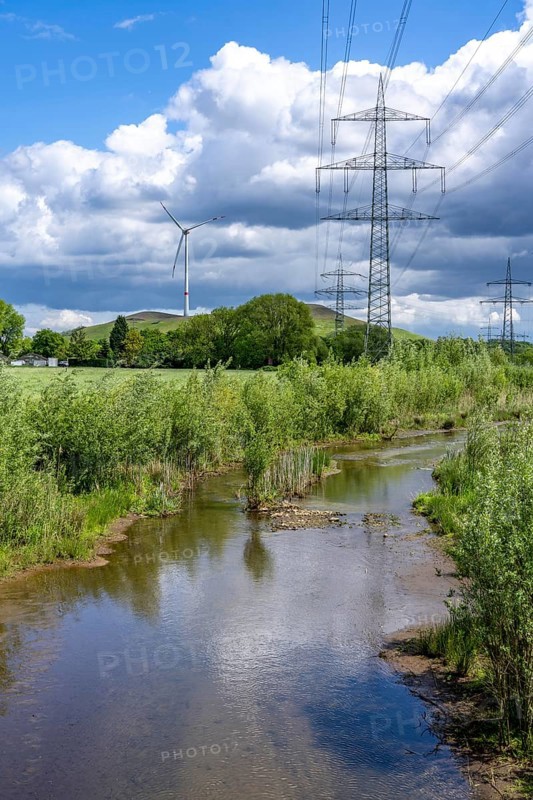 Boyetal-Ost landscape conservation area, flood meadows, lower course of the Boye, stream, runs through the towns of Gladbeck, Bottrop (photo) and Essen over 13.8 km, a former cesspit, sewage river, since 2017 the sewage has been canalised, the Boye is free of sewage and in large parts, as here in Essen, renaturalised, part of the Emscher conversion project, behind the Mottbruch slag heap, North Rhine-Westphalia, Germany, Europe