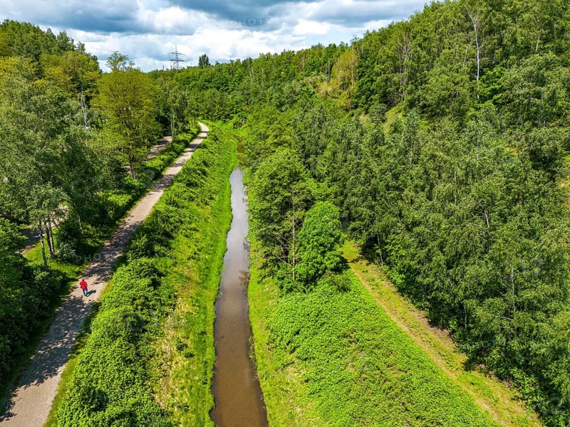 The Boye, stream, runs for 13.8 km through the towns of Gladbeck, Bottrop (photo) and Essen, a former cesspit, sewage river, since 2017 the sewage has been canalised, the Boye is sewage-free and in large parts, as here in Bottrop, renaturalised, along the Rheinbaben slag heap, part of the Emscher conversion project, North Rhine-Westphalia, Germany, Europe
