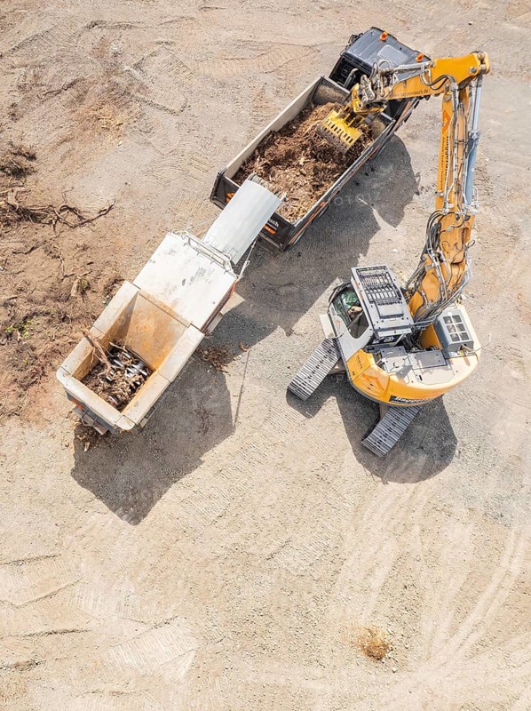 Aerial view of an excavator and a lorry working on a large construction site, demolition site, recycling, Saarbrücken, Germany, Europe