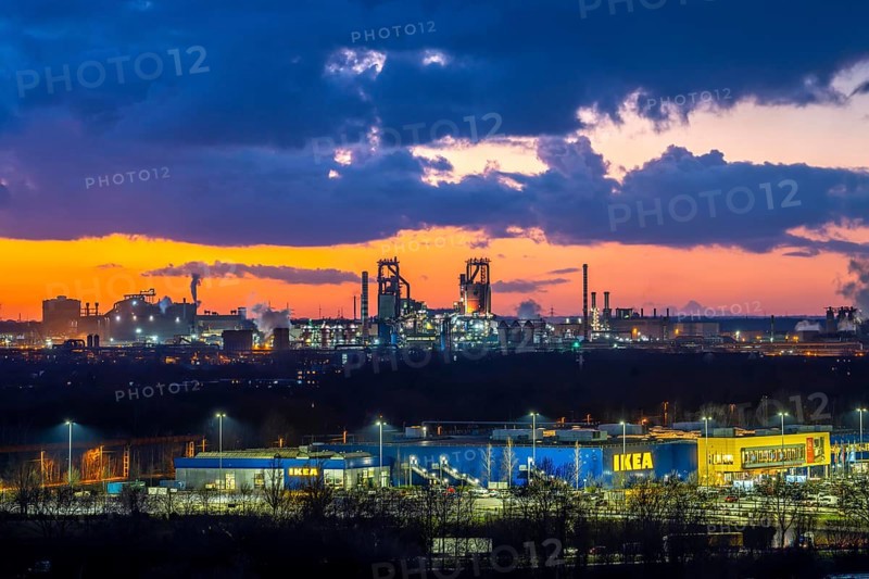 Skyline of the Duisburg steel site, Thyssenkrupp Steel Europe, in Duisburg-Bruckhausen, sunset, industrial backdrop, North Rhine-Westphalia, Germany Blast furnaces 8 and 9, industrial estate, IKEA, furniture store