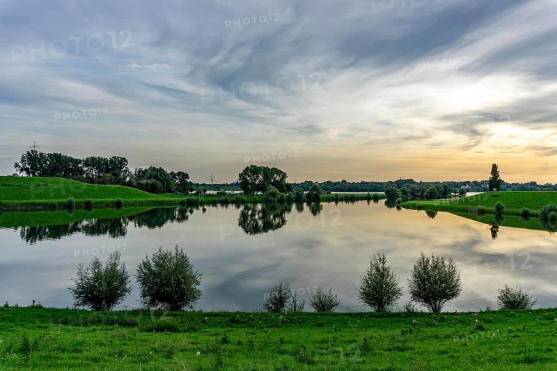 Lower Rhine landscape, reflection in the turning basin of the northern harbour of Walsum, view to the west, direction Orsory, North Rhine-Westphalia, Germany, Europe