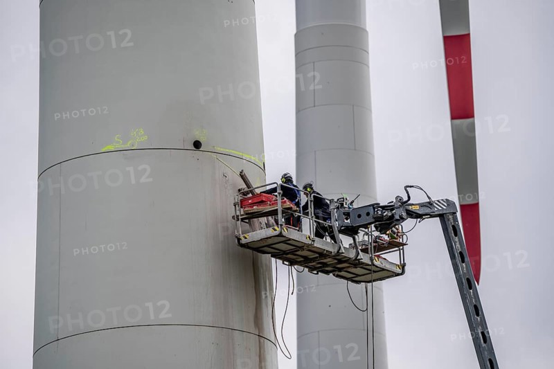 Preparation for the demolition of the tower of a 20 year old wind turbine, in the Werl wind farm, 5 old Enercon E-66 turbines are demolished, 2 new Siemens SG6.6-170 wind turbines replace them, the WTGs produce twice as much energy, 12 MW power, as the 5 old wind turbines, called repowering, Werl, North Rhine-Westphalia, Germany, Europe