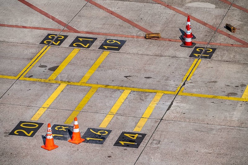 Park markings on the ground, at the terminal, in front of the passenger boarding bridge, holding areas for different types of aircraft, brake blocks, Amsterdam Airport Schiphol, Netherlands