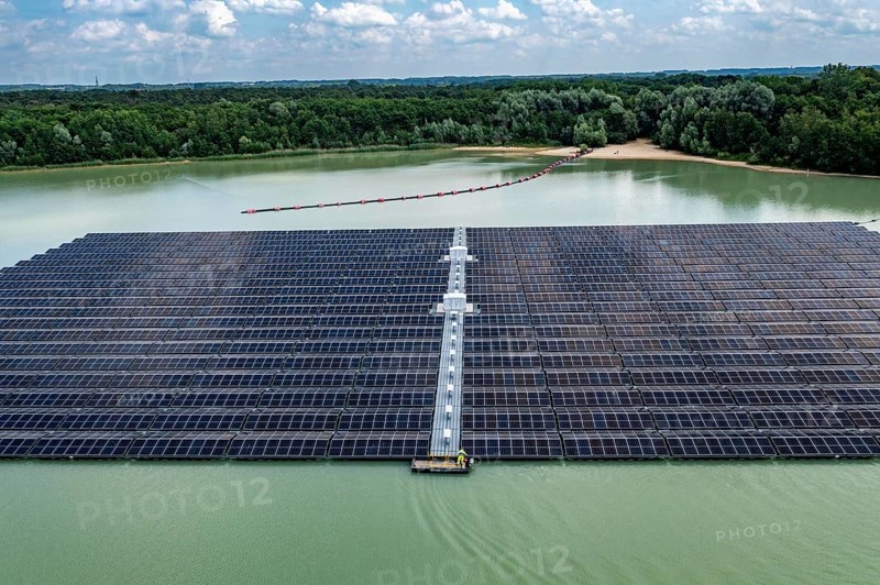 Germany's largest floating solar power plant on the Silbersee III, a quarry pond no longer used for sand mining, near Haltern am See, operated by Quarzwerke GmbH, around 5800 solar modules, on an area of a good 2 football pitches, generate 3.1 megawatts of power, the company uses the electricity itself on weekdays, at weekends it flows into the public grid, North Rhine-Westphalia, Germany, Europe