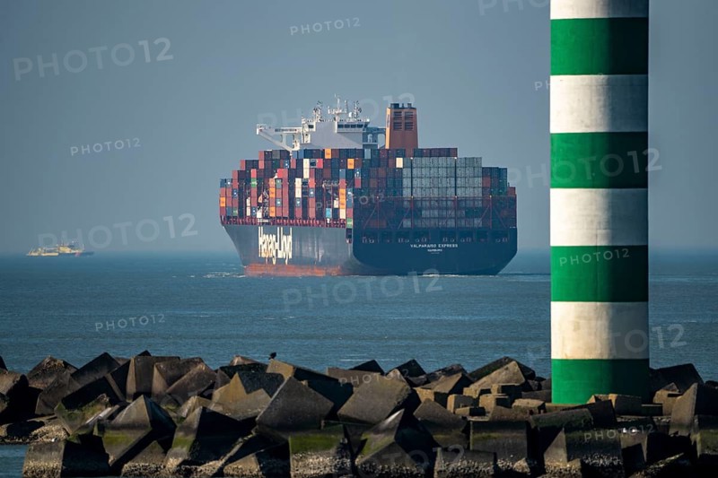 Container freighter VALPARAISO EXPRESS, of the shipping company Hapag-Lloyd, in the harbour exit of the deep-sea port Maasvlakte 2, the seaport of Rotterdam, Netherlands, on an artificial land area off the original coast